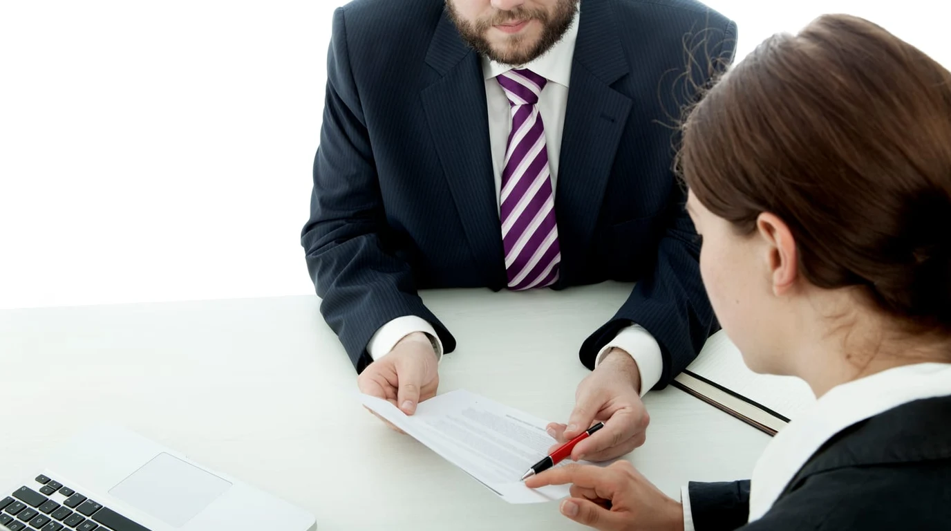 Couple Reviewing Spousal RRSP Documents and Retirement Tax Strategy